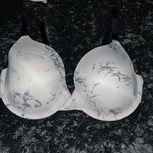white bra with a marble print it’s white and black